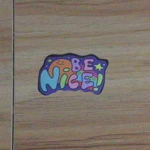 inspirational “be nice” multicolor sticker